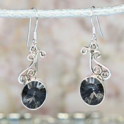 Srebrne kolczyki Mistyczny Topaz